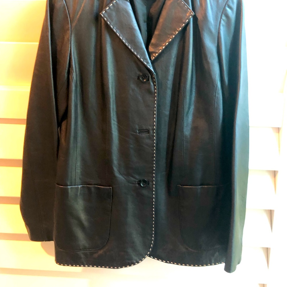 EUC Black Lamb Leather.  Accented with white stitching.  Perfect for fall.